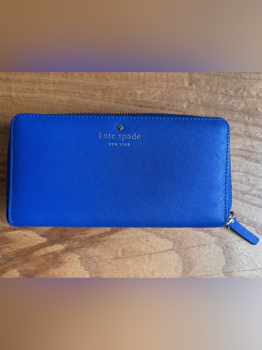 Kate Spade cobalt blue zip-around leather wallet
